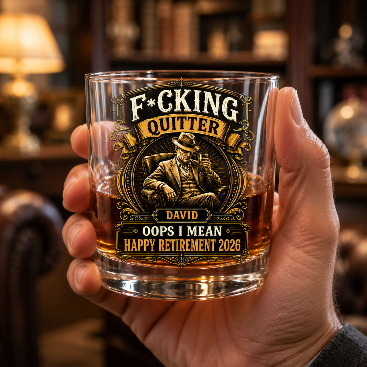 Funny retirement gift for dad whiskey glass held by hand in a warm blurred study background, personalized David Happy Retirement 2026