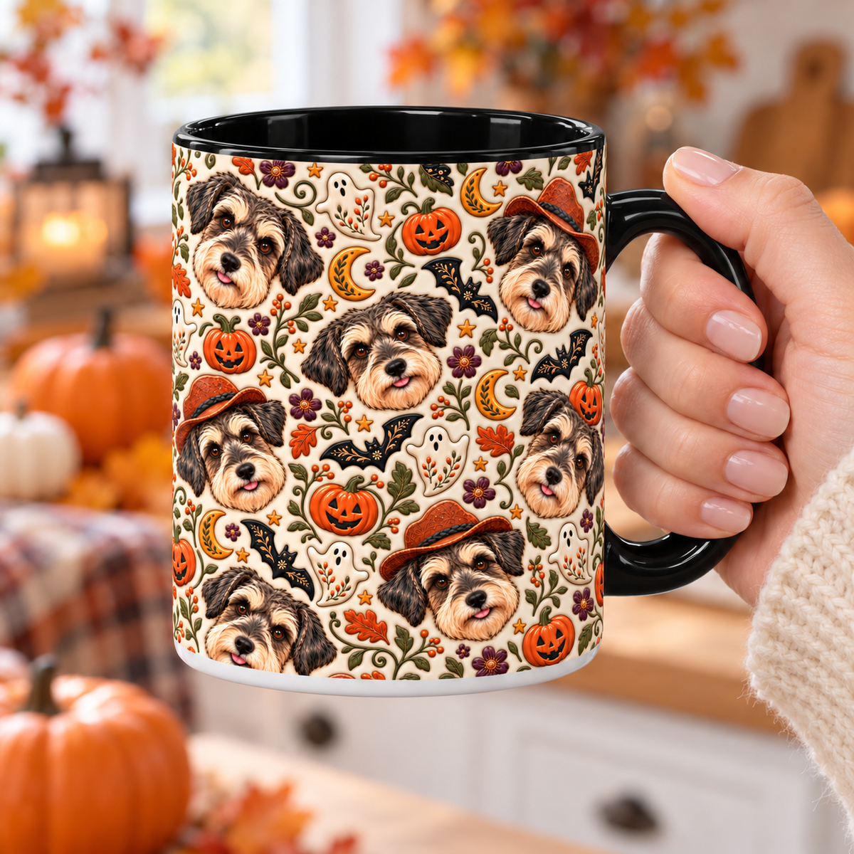 A woman holding the black handle of a personalized dog photo mug with full-wrap Halloween folk art artwork