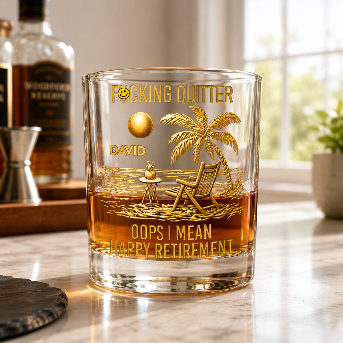 Personalized retirement whiskey glass gift for him with gold palm tree beach artwork and Happy Retirement design on a modern bar