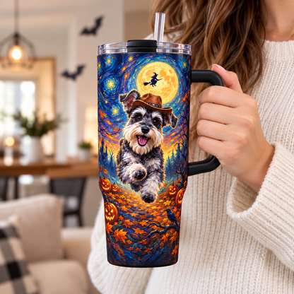 A woman holding the 40 oz Halloween dog tumbler by its handle